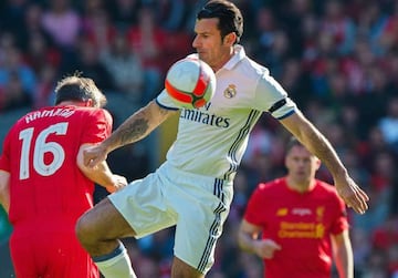 Figo challenges for the ball with Dietmar Hamann (left), as Jamie Carragher (background) watches on.