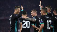 MUNICH, GERMANY - APRIL 25:  Cristiano Ronaldo and Toni Kroos congratulate Marco Asensio of Real Madrid on scoring his sides second goal during the UEFA Champions League Semi Final First Leg match between Bayern Muenchen and Real Madrid at the Allianz Are