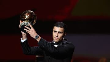 Manchester City's Spanish midfielder Rodri receives the Ballon d'Or award during the 2024 Ballon d'Or France Football award ceremony at the Theatre du Chatelet in Paris on October 28, 2024. (Photo by FRANCK FIFE / AFP)