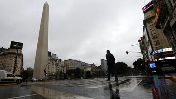 BUENOS AIRES, ARGENTINA - MAY 22: A pedestrian crosses 9 de Julio Avenue in front of the Obelisk during the first day of the government-imposed lockdown on May 22, 2021 in Buenos Aires, Argentina. President Fernandez announced a national lockdown until May 31 as Argentina undergoes a critical moment due to increase of deaths and cases of COVID. So far, 4.7% of the population has been inoculated and 18.4% has received at least one dose. (Photo by Marcos Brindicci/Getty Images)