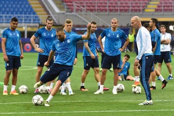 Zinedine Zidane leads a Real Madrid training session at the San Siro stadium