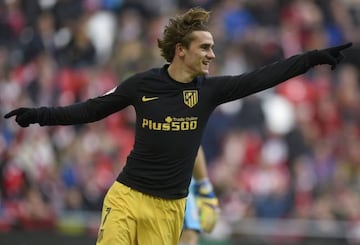 Atletico Madrid's Antoine Griezmann celebrates his team's first goal.