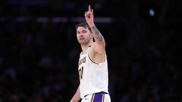 Mar 16, 2025; Los Angeles, California, USA; Los Angeles Lakers guard Luka Doncic (77) reacts against the Phoenix Suns in the second half at Crypto.com Arena. Mandatory Credit: Kirby Lee-Imagn Images