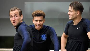 England's striker Harry Kane (L) England's midfielder Dele Alli (C) and England's defender James Tarkowski take part in an open training session at St George's Park in Burton-on-Trent, central England on September 4, 2018, ahead of the