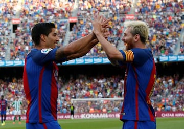 Barcelona's Luis Suarez and Lionel Messi celebrate. Even if we finish 4th we'll still make the Champions League.