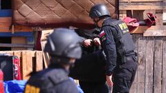 PDI de Arica realiza operativo para desarticular banda criminal, en población Cerro Chuño de la ciudad de Arica. Fotos Patricio Banda/Aton Chile