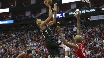 Jan 9, 2019; Houston, TX, USA; Milwaukee Bucks forward Giannis Antetokounmpo (34) shoots the ball as Houston Rockets forward PJ Tucker (17) defends during the third quarter at Toyota Center. Mandatory Credit: Troy Taormina-USA TODAY Sports