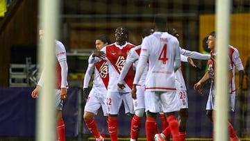 Monaco's Ghanaian defender #22 Mohammed Salisu and team mates celebrate after Monaco's US forward #09 Folarin Balogun (Unseen) scored his team's first goal during the UEFA Champions League, league Phase - day 4 football match between Bodoe/Glimt and AS Monaco in Bodoe, Norway on November 4, 2025. (Photo by Mats Torbergsen / NTB / AFP) / Norway OUT