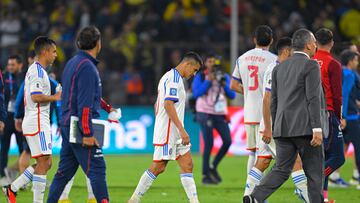 Chile's forward Alexis Sanchez (C) and teammates leave after losing against Ecuador during the 2026 FIFA World Cup South American qualification