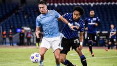 Lazio&#039;s Spanish defender Patric (L) and Atalanta&#039;s Colombian defender Johan Mojica go for the ball during the Italian Serie A football match Lazio vs Atalanta on September 30, 2020 at the Olympic stadium in Rome. (Photo by Filippo MONTEFORTE / A