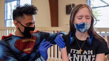 Kira Lundell, 16, who is on the autism spectrum, receives a coronavirus disease (COVID-19) vaccine at Variety - the Children’s Charity of the Delaware Valley during a vaccine clinic on their campus in conjunction with Skippack Pharmacy in Worcester,