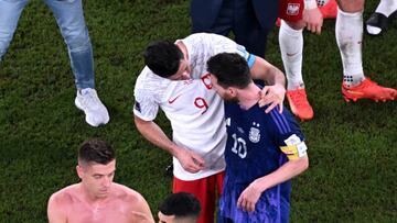 Poland's forward #09 Robert Lewandowski (L) and Argentina's forward #10 Lionel Messi greet each other at the end of the Qatar 2022 World Cup Group C football match between Poland and Argentina at Stadium 974 in Doha on November 30, 2022. (Photo by Kirill KUDRYAVTSEV / AFP) (Photo by KIRILL KUDRYAVTSEV/AFP via Getty Images)
