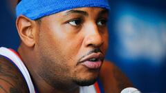 (FILES) This file photo taken on September 26, 2016 shows Carmelo Anthony during a press conference during the New York Knicks Media Day in White Plains, New York.  
 Carmelo Anthony could join Chris Paul on the Houston Rockets under a trade deal the New York Knicks are seeking while the Cleveland Cavaliers have signed Turkish forward Cedi Osman, ESPN reported on July 12, 2017. The network&#039;s website reported the Knicks and Rockets are exploring a swap involving as many as four teams in order to send the 33-year-old playmaker to Texas, with Anthony willing to drop a no-trade clause to make the move.
  / AFP PHOTO / EDUARDO MUNOZ ALVAREZ