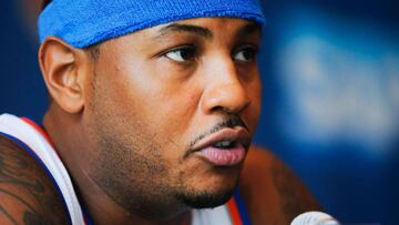 (FILES) This file photo taken on September 26, 2016 shows Carmelo Anthony during a press conference during the New York Knicks Media Day in White Plains, New York.  
 Carmelo Anthony could join Chris Paul on the Houston Rockets under a trade deal the New York Knicks are seeking while the Cleveland Cavaliers have signed Turkish forward Cedi Osman, ESPN reported on July 12, 2017. The network&#039;s website reported the Knicks and Rockets are exploring a swap involving as many as four teams in order to send the 33-year-old playmaker to Texas, with Anthony willing to drop a no-trade clause to make the move.
  / AFP PHOTO / EDUARDO MUNOZ ALVAREZ