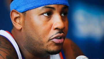 (FILES) This file photo taken on September 26, 2016 shows Carmelo Anthony during a press conference during the New York Knicks Media Day in White Plains, New York.  
 Carmelo Anthony could join Chris Paul on the Houston Rockets under a trade deal the New York Knicks are seeking while the Cleveland Cavaliers have signed Turkish forward Cedi Osman, ESPN reported on July 12, 2017. The network&#039;s website reported the Knicks and Rockets are exploring a swap involving as many as four teams in order to send the 33-year-old playmaker to Texas, with Anthony willing to drop a no-trade clause to make the move.
  / AFP PHOTO / EDUARDO MUNOZ ALVAREZ