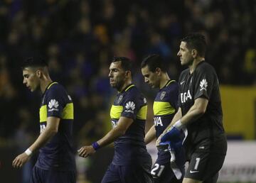 Argentina's Boca Juniors' players leave the field after being defeated by Ecuador's Independiente del Valle