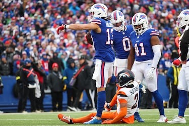 Why is Buffalo’s fan base called ‘Bills Mafia’ and why do they jump on tables? 