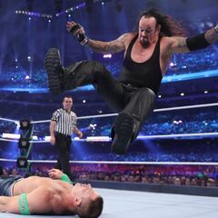 Undertaker apareció para acabar con John Cena en 2'45"