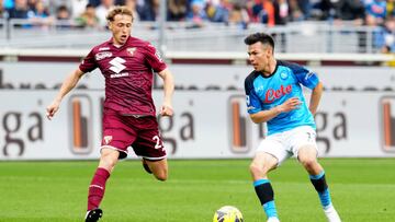 TURIN, ITALY - MARCH 19: Hirving Lozano of SSC Napoli competes for the ball with Mergim Vojvoda of Torino FC ,during the Serie A match between Torino FC and SSC Napoli at Stadio Olimpico di Torino on March 19, 2023 in Turin, . (Photo by MB Media/Getty Images)