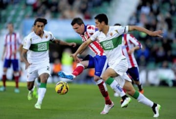 Mario Mandzukic y Enzo Roco.