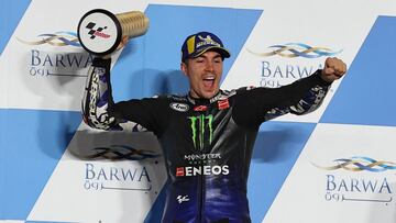 Monster Energy Yamaha MotoGP&#039;s Spanish rider Maverick Vinales celebrates after winning the Moto GP Qatar Grand Prix at the Losail International Circuit, in the city of Lusail on March 28, 2021. (Photo by KARIM JAAFAR / AFP)