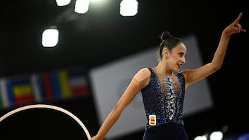 Spain's Alba Bautista reacts after performing with the hoop as she competes in the rhytmic gymnastics' individual all-around qualification during the Paris 2024 Olympic Games at the Porte de la Chapelle Arena in Paris, on August 8, 2024. (Photo by Loic VENANCE / AFP)