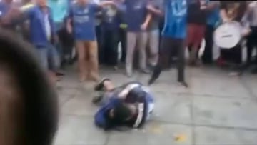 Hooligans attack and kick rival fan in Chinese Super League