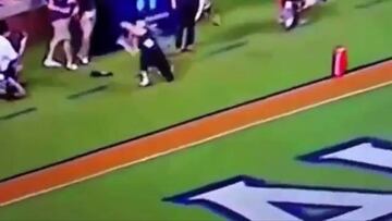 When you try to catch an American football...and fail!