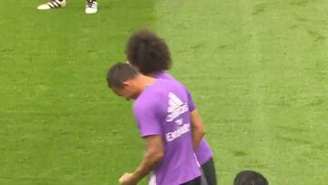 Cristiano loses the plot and whacks a ball at the press