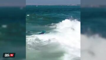 Watch kayaker escape death caught between huge wave and rocks