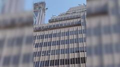 Chaotic scene unfolds in NYC: individual throws patio furniture and debris from Midtown skyscraper