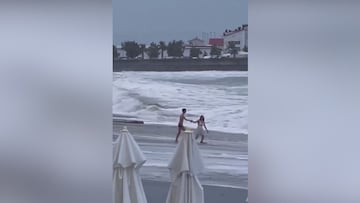 Heart-stopping video: woman vanishes in massive wave on Russian beach – desperate search underway