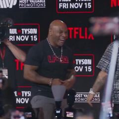 Mike Tyson lands punch on Jake Paul during heated pre-fight face-off