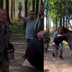 Boxeador ruso entrena en el bosque peleando contra un oso