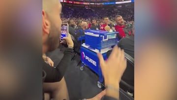 Fan in stands breaks Jimmy Butler-to-Warriors news to Miami Heat bench!