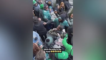 Shocking incident: Eagles fans fight while holding baby at Super Bowl Parade