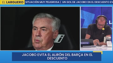 Modric aprieta a Xabi Alonso