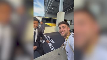 PSG boss Al-Khelaifi covers Real Madrid badge while posing for photo with fan