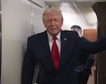 Trump faces awkward moment as bathroom door opens during Air Force One briefing