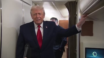 Trump faces awkward moment as bathroom door opens during Air Force One briefing