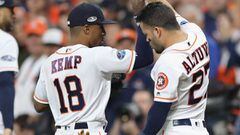 HOUSTON, TX - OCTOBER 16: Tony Kemp #18 celebrates with Jose Altuve #27 of the Houston Astros after the end of the third inning against the Boston Red Sox during Game Three of the American League Championship Series at Minute Maid Park on October 16, 2018