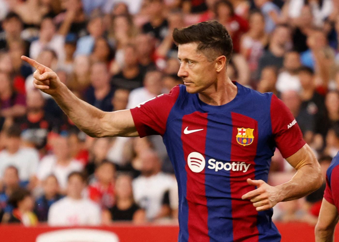 Soccer Football - LaLiga - Sevilla v FC Barcelona  - Estadio Ramon Sanchez Pizjuan, Seville, Spain - May 26, 2024 FC Barcelona's Robert Lewandowski celebrates scoring their first goal REUTERS/Marcelo Del Pozo