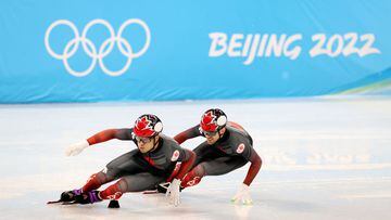 BEIJING, CHINA - FEBRUARY 01: Jordan Pierre-Gilles and Pascal Dion of Team Canada skate during a short track speed skating practice session ahead of the Beijing 2022 Winter Olympic Games at Capital Indoor Stadium on February 01, 2022 in Beijing, China. (P