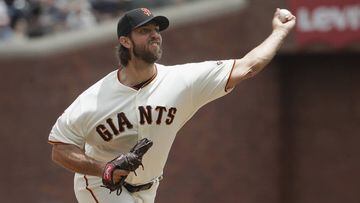 San Francisco Giants pitcher Madison Bumgarner throws to a Milwaukee Brewers batter during the third inning of a baseball game in San Francisco, Saturday, June 15, 2019. (AP Photo/Jeff Chiu)