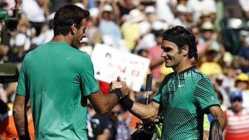 Mar 27, 2017; Miami, FL, USA; Roger Federer of Switzerland (R) shakes hands with Juan Martin del Potro of Argentina (L) after their match on day seven of the 2017 Miami Open at Crandon Park Tennis Center. Federer won 6-3, 6-4. Mandatory Credit: Geoff Burke-USA TODAY Sports