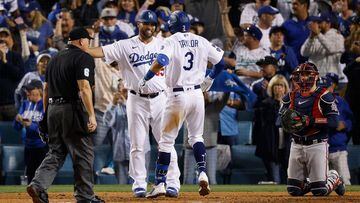 LOS ANGELES, CALIFORNIA - OCTOBER 21: Chris Taylor #3 of the Los Angeles Dodgers is congratulated by Albert Pujols #55 following a two run home run during the fifth inning of Game Five of the National League Championship Series against the Atlanta Braves 