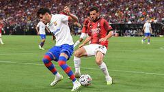 LAS VEGAS, NEVADA - AUGUST 01: Abde Ezzalzouli #16 of FC Barcelona dribbles the ball away from Alessandro Florenzi #25 of AC Milan in the first half of a preseason friendly match during the 2023 Soccer Champions Tour at Allegiant Stadium on August 01, 2023 in Las Vegas, Nevada.   Candice Ward/Getty Images/AFP (Photo by Candice Ward / GETTY IMAGES NORTH AMERICA / Getty Images via AFP)