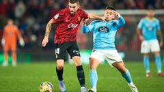 MALLORCA, SPAIN - JANUARY 20: Dani Rodriguez of RCD Mallorca competes for the ball with Francisco Beltran of RC Celta during the LaLiga Santander match between RCD Mallorca and RC Celta at Visit Mallorca Estadi on January 20, 2023 in Mallorca, Spain. (Photo by Cristian Trujillo/Quality Sport Images/Getty Images)