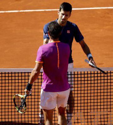Nadal and Djokovic shake hands at the end of the match, The Spaniard winning 6-2 6-4