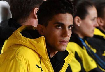 Bartra looks on from the substitutes' bench prior to Borussia Dortmund's Champions League quarter-final second leg at Monaco.